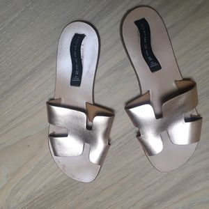 Rose gold slides. Steven brand